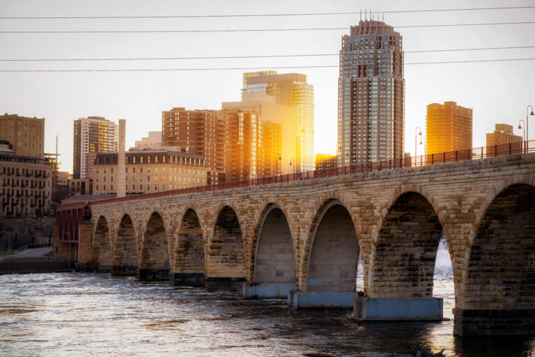 Stone Arch Bridge Sunset over the Mississippi River 4 The Stone Arch Bridge in downtown Minneapolis.