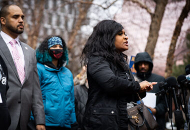 Activists speak outside the courthouse following the announcement of no charges against officers involved in the February 2nd shooting death of Amir Locke.