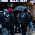Agape Movement members at George Floyd Square on May 25th, 2022. One year prior the city coordinated with the group to remove barricades at the square.