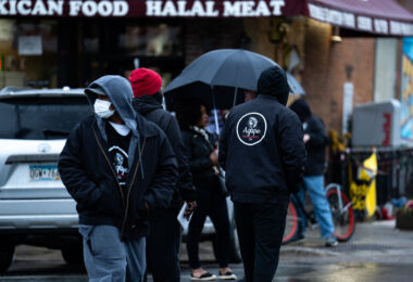 Agape Movement members at George Floyd Square on May 25th, 2022. One year prior the city coordinated with the group to remove barricades at the square.