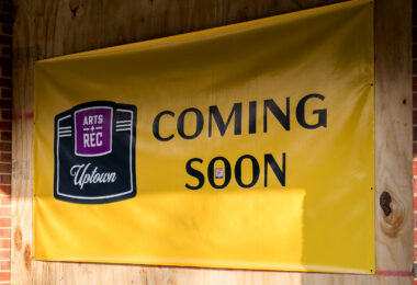 Signage for a new business that describes itself as a "brand new art-focused experiential concept and restaurant." up in the former Libertine Bar space in Seven Points Mall.