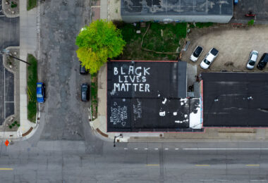 An apartment building with "Black Lives Matter" on the roof.