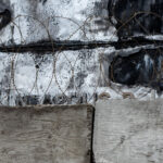 Concrete blocks and razor wire up against the former entrance of the Minneapolis Police 3rd precinct police station. The station was burned by protesters following the May 25, 2020 murder of George Floyd.