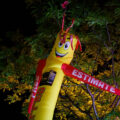 A blow up advertisement thing in front of a store in Minneapolis.