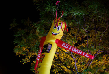 A blow up advertisement thing in front of a store in Minneapolis.