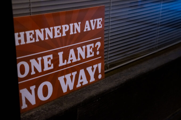 Hennepin Ave Window Sign, Minneapolis 3 Hennepin Ave sign in Minneapolis reads “One Lane? No Way!”