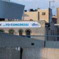 An Ilhan Omar banner on the side of a Lake Street building in South Minneapolis.