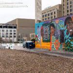 A mural by artist Melodee Strong on the side of a building on Lake Street.