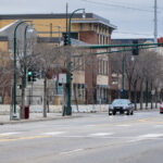 The Minneapolis police third precinct police station around fencing.  The police station, which was burned by protesters in May 2020, has sat vacant and fortified ever since.