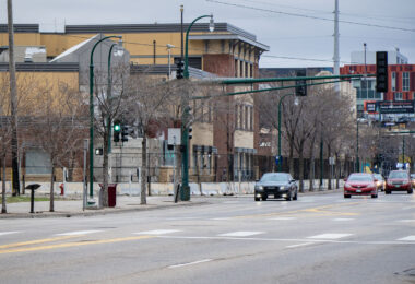 The Minneapolis police third precinct police station around fencing.  The police station, which was burned by protesters in May 2020, has sat vacant and fortified ever since.