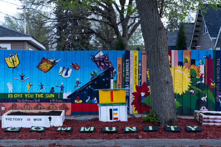 Mural on a fence near George Floyd Square May 2022 2 An art installation on fencing near George Floyd Square in South Minneapolis.