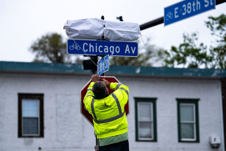 New street signs at George Floyd Square 2 On the 2 year anniversary of his murder and a couple weeks after the commemorative street name was changed to George Perry Floyd Square, a sign was revealed. Afterwards the community held an Angelversary Candlelight Vigil at the Say Their Names Cemetery memorial.