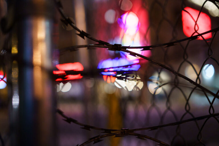 Razor wire on fencing around a parking garage in Uptown Minneapo 1 Razor wire on fencing around a parking ramp at Lake Street and Girard Ave in Uptown Minneapolis.
The area was home to protests following the shooting death of Winston Smith at the top of the ramp by a federal task force.