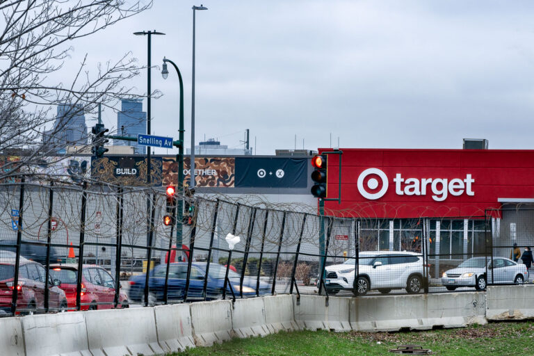 05/01/22 Minneapolis Police Third Precinct 1 Razor wire surrounding the Minneapolis Police Third precinct parking lot. Target can been seen across the street. The Target was rebuilt after suffering damage during the riots that followed the May 25, 2020 murder of George Floyd by the Minneapolis police.