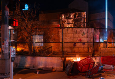 Protesters marched with a banner reading “Remember May 28th” to the third precinct tonight where fireworks were sent up and shopping carts were set on fire before moving on.