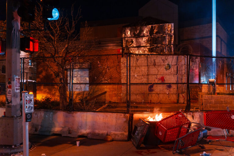 Remember May 28th at the Minneapolis Police Third Precinct 3 Protesters marched with a banner reading “Remember May 28th” to the third precinct tonight where fireworks were sent up and shopping carts were set on fire before moving on.