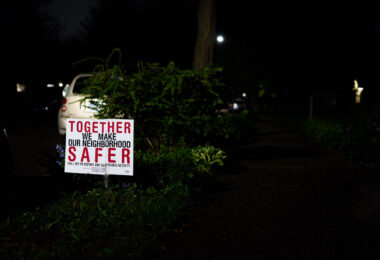 A yard sign reading "Together we make our neighborhood safer" in South Minneapolis.