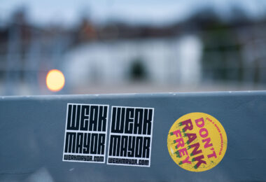 Stickers referring to Minneapolis Mayor Jacob Frey. Reading “Weak Mayor” and “Don’t Rank Frey”.