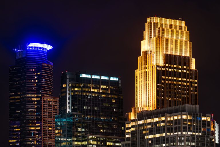 Wells Fargo Center and Capella Tower, Minneapolis Skyline 2 Wells Fargo Center and Capella Tower rise above the downtown Minneapolis skyline at night.