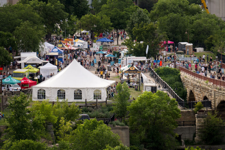 Stone Arch Festival booths setup in Downtown Minneapolis 4 Booths setup at the Stone Arch Festival in downtown Minneapolis.
