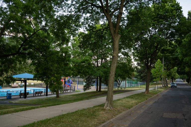 South Minneapolis Park with Pool and Playground 1 South Minneapolis park with a pool, playground, and tennis courts.