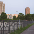 A family walks down a trail near Riverside Plaza in Minneapolis.