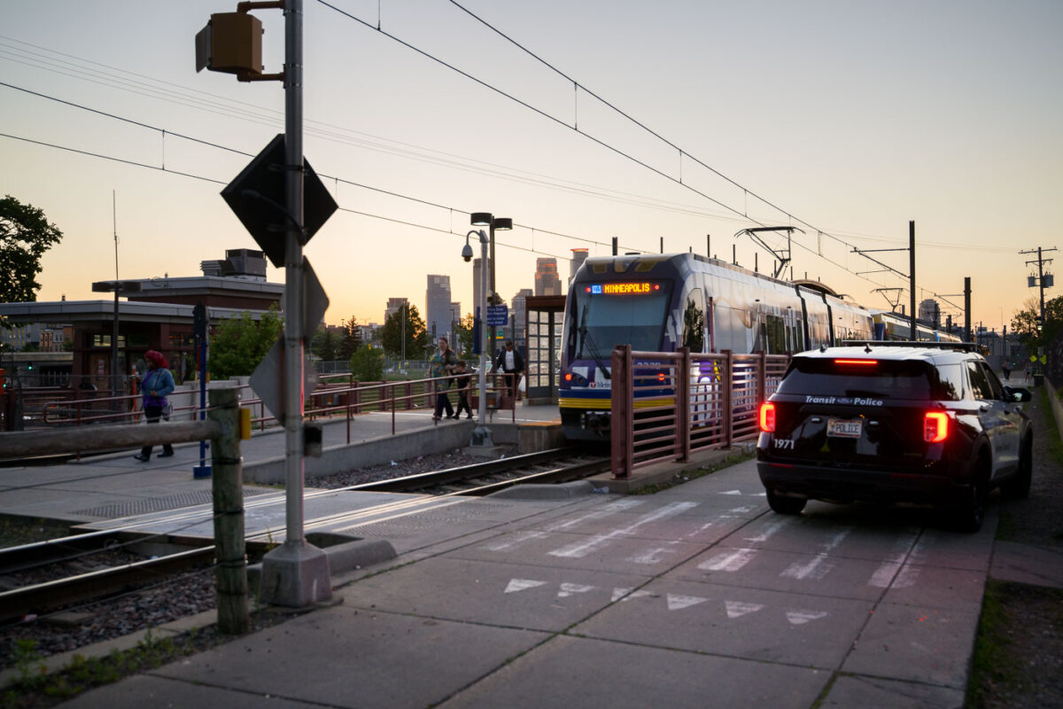 Franklin Avenue Light Rail station with a Metro Transit squad car.