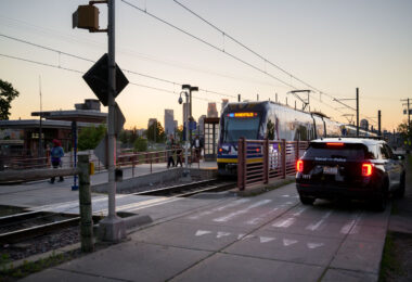 Franklin Avenue Light Rail station with a Metro Transit squad car.