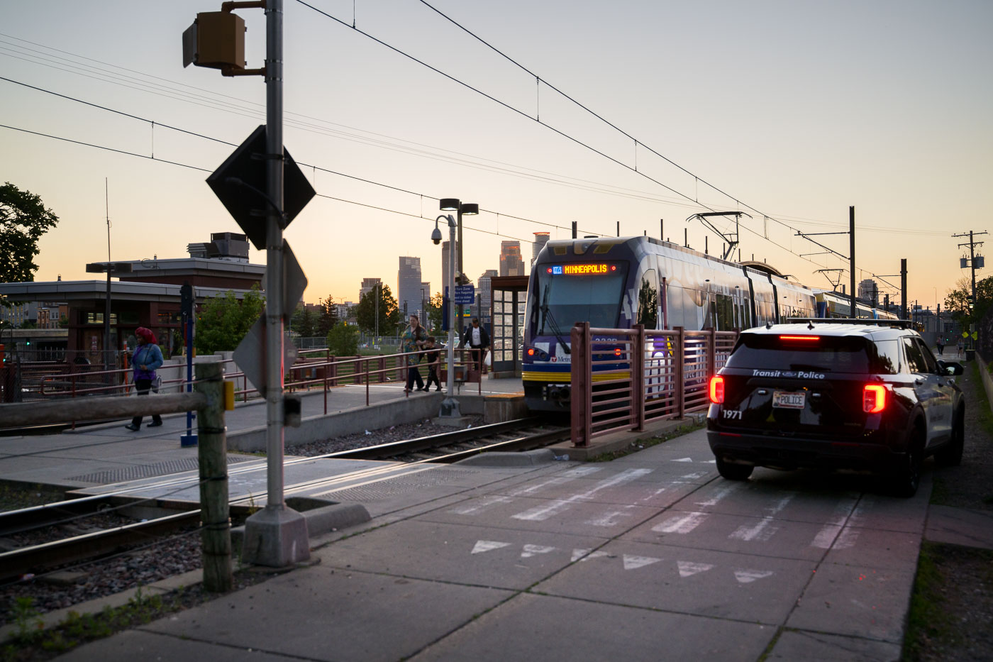 Franklin Avenue light rail station in South Minneapolis with a squad car