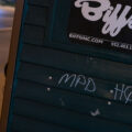 MPD HQ written on a porta potty.