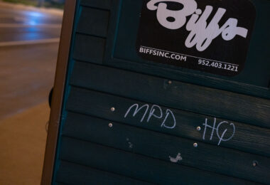 MPD HQ written on a porta potty.