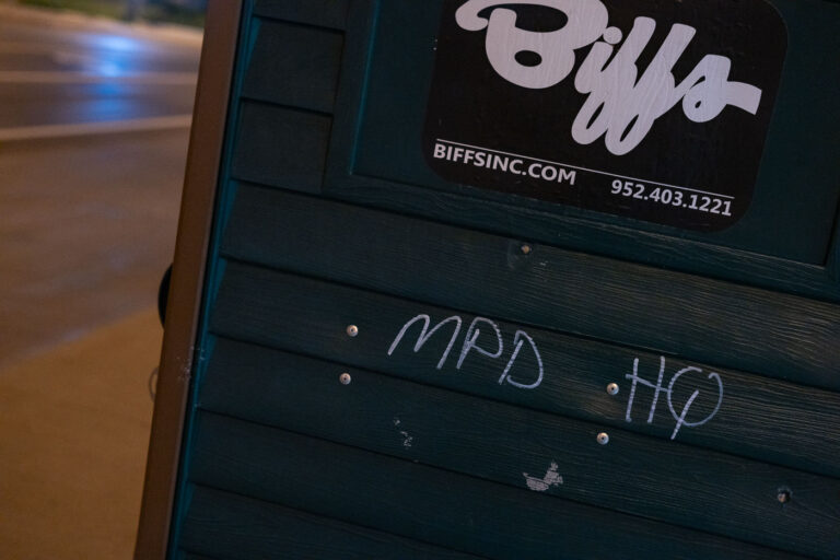 MPD HQ graffiti written on Minneapolis Porta Potty 4 MPD HQ written on a porta potty.