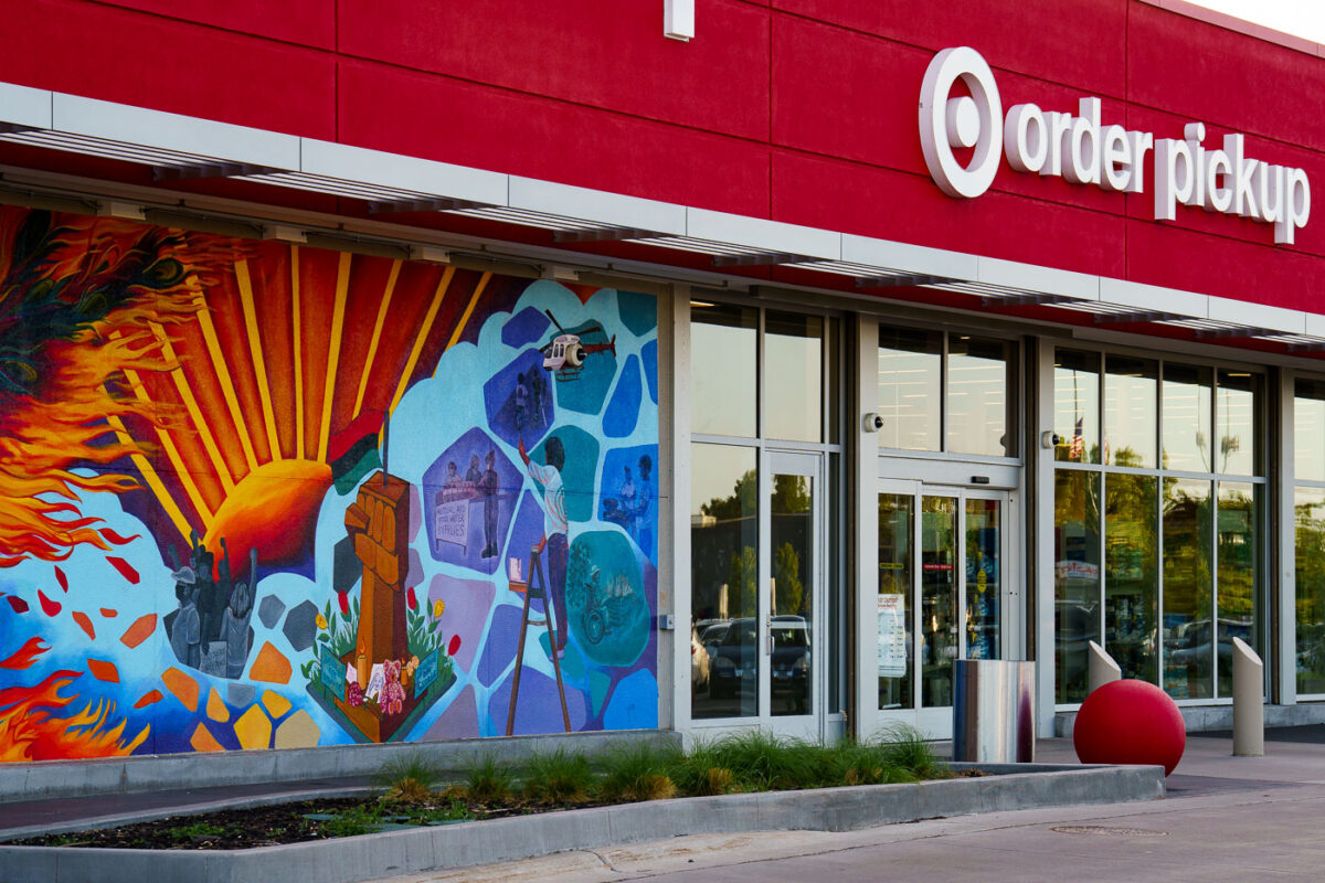 A mural on the Target Store across from the third precinct. "As part of our plan to reopen the store, we committed to co-creating permanent murals on the store’s exterior that reflect the Lake Street community." 7 local artists shared their interpretations of the words  "rooted, change, resilience, healing, growth, renewal and together."