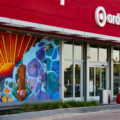 A mural on the Target Store across from the third precinct. "As part of our plan to reopen the store, we committed to co-creating permanent murals on the store’s exterior that reflect the Lake Street community." 7 local artists shared their interpretations of the words  "rooted, change, resilience, healing, growth, renewal and together."