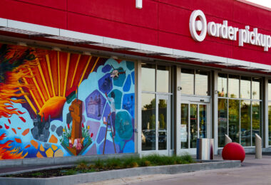 A mural on the Target Store across from the third precinct. "As part of our plan to reopen the store, we committed to co-creating permanent murals on the store’s exterior that reflect the Lake Street community." 7 local artists shared their interpretations of the words  "rooted, change, resilience, healing, growth, renewal and together."