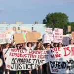 Protesters march in Minneapolis on June 24th, 2020 following the Supreme Court overturning Roe V. Wade.