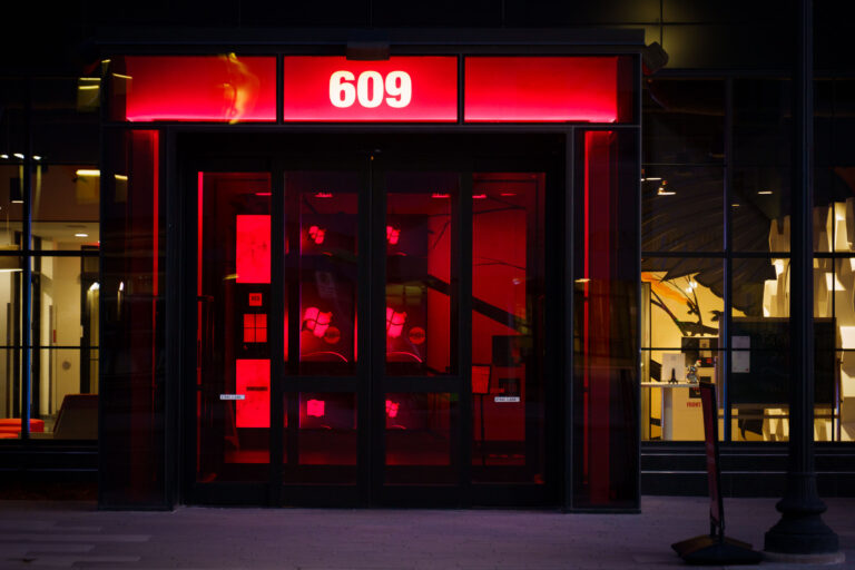 Radisson RED Entrance, 609 Washington Ave S 3 Radisson RED hotel entrance at 609 Washington Avenue South in Minneapolis, lit in red.