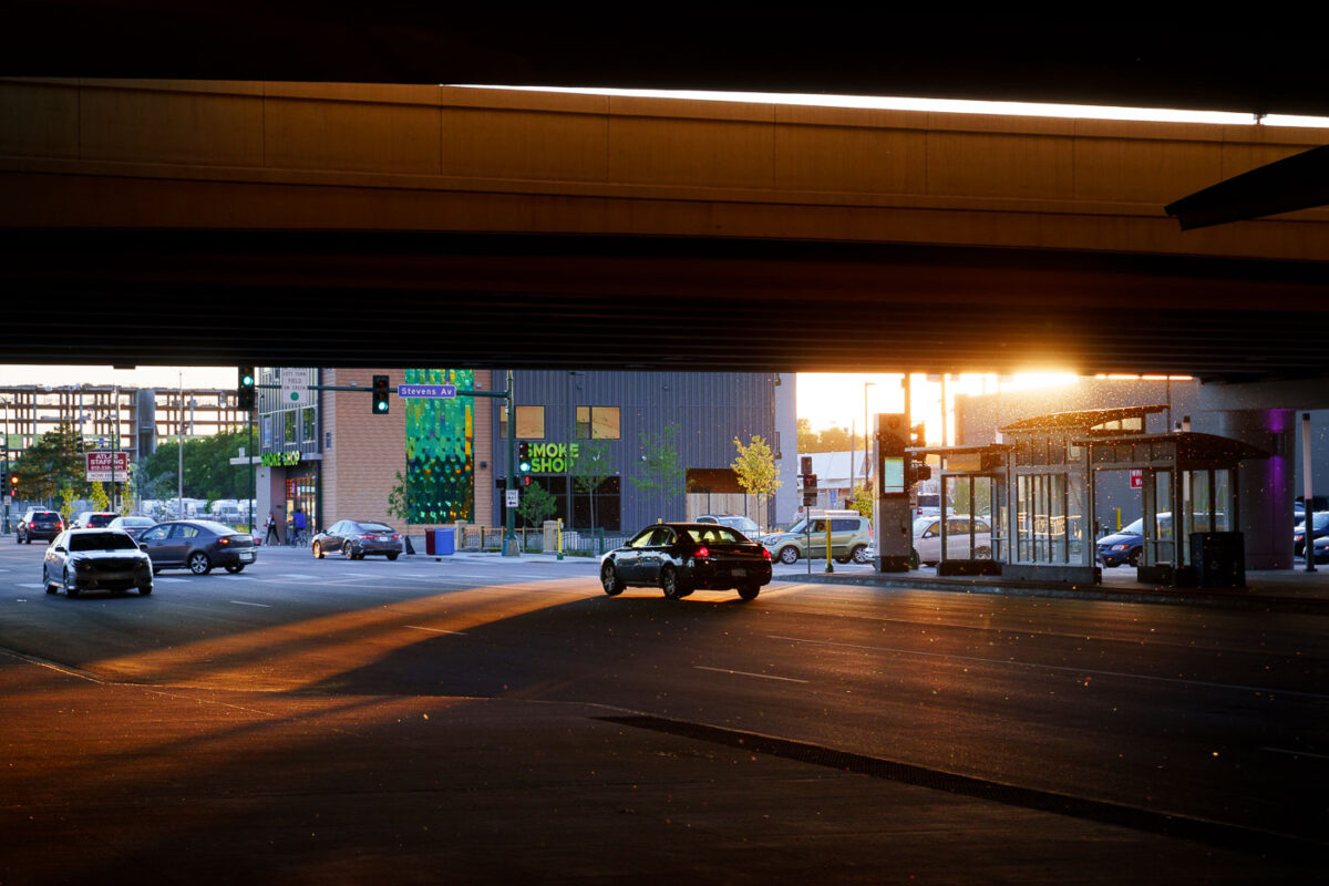 Sun goes down under the I-35W bridge in Minneapolis.