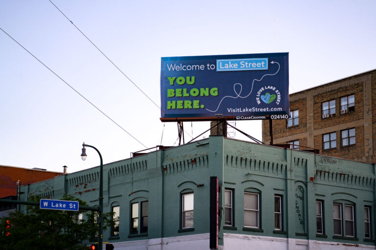 Welcome to Lake Street You Belong Here 3 A billboard at Lake Street and Lyndale Ave in Uptown Minneapolis reading "Welcome to Lake Street. You belong here."