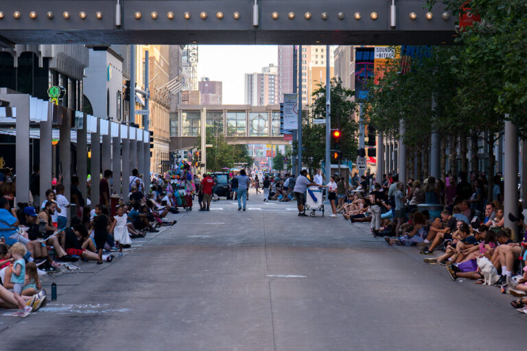 Minneapolis Torchlight Parade on Nicollet Mall, July 20, 2022 8 On July 20, 2022, crowds gathered along Nicollet Mall in downtown Minneapolis for the annual Torchlight Parade. This event, a traditional precursor to the Minnesota State Fair, transforms the pedestrian mall into a vibrant public space. Nicollet Mall, a central thoroughfare for commerce and community events, has been a focal point for Minneapolis's urban life since its pedestrianization in the 1960s. The parade route highlights the city's community spirit and provides a lively atmosphere for residents and visitors.
