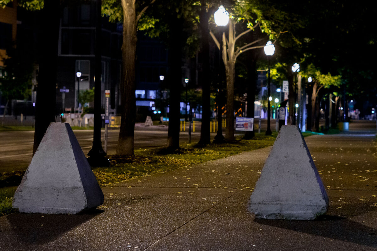 Barricades placed on sidewalks in downtown Minneapolis after "hot rodders" took over the area multiple weekends.