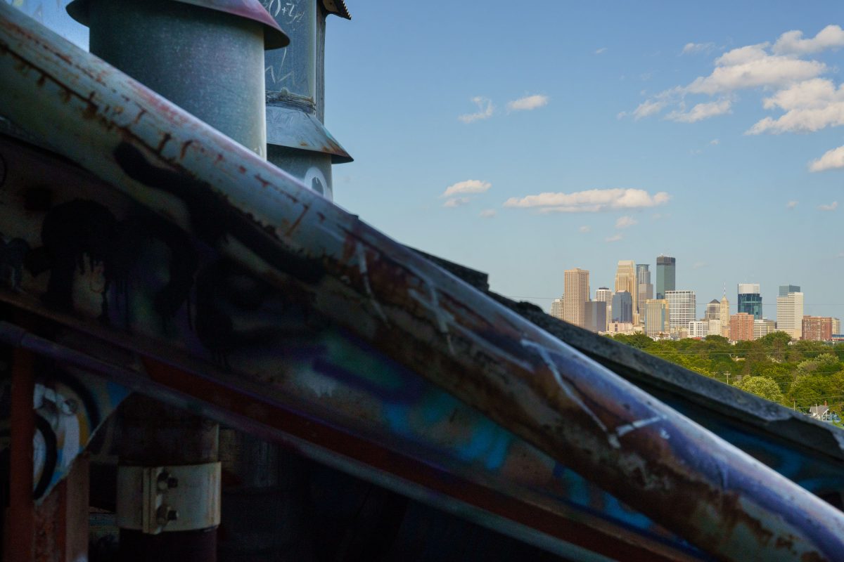 Rusted industrial pipe and grain elevator structure at the abandoned Fruen Mill in Minneapolis.