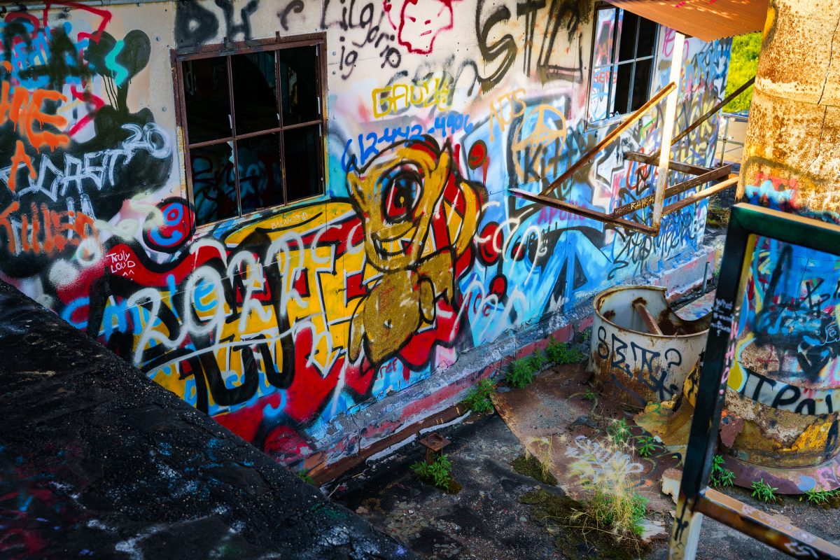 Colorful graffiti covers the exterior walls of the abandoned Fruen Mill in Minneapolis.