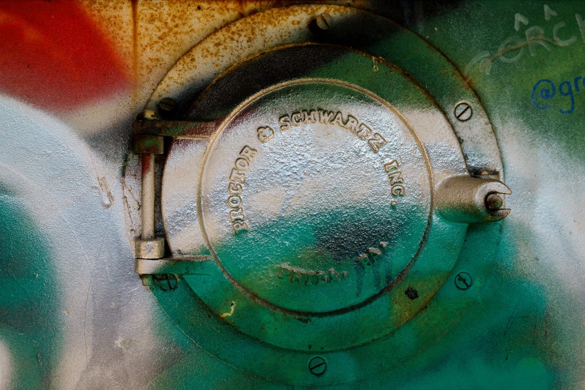 Cast iron valve with embossed text inside the abandoned Fruen Mill, Minneapolis.