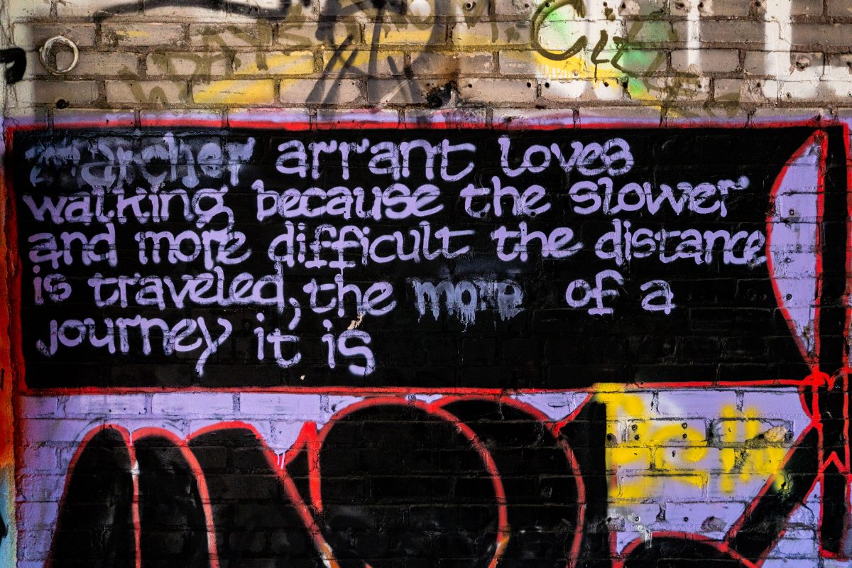 Graffiti-covered brick wall inside the abandoned Fruen Mill industrial complex in Minneapolis.