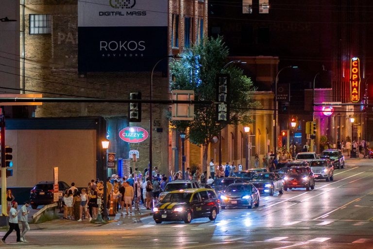 Minneapolis North Loop: Crowds on Washington Ave at Night 4 Crowds outside bars on Washington Avenue in Minneapolis North Loop at night.