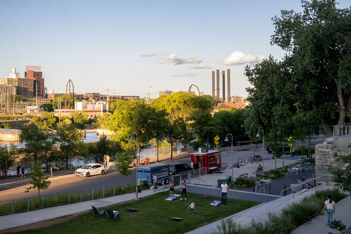 Minneapolis Stone Arch Bridge area with food trucks and games