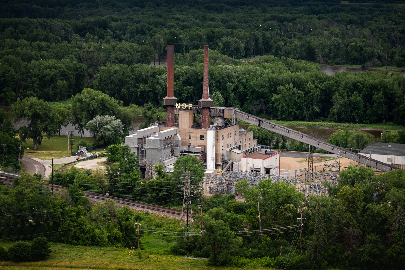 Power plant surrounded by trees