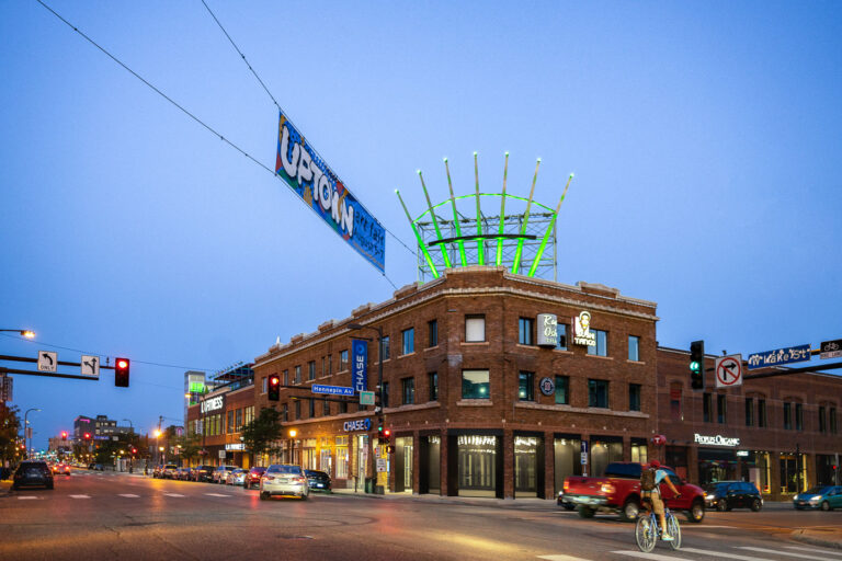 Biker on Hennepin Ave in Minneapolis at dusk 3 A biker at Hennepin Ave and Lake Street in Uptown Minneapolis during dusk.