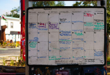 The Calendar at The People's Way inside George Floyd Square. The board has shown community events.